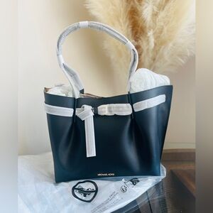 Michael Kors Black Tote with Gold Accents and Spacious Design